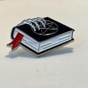 Creepy hand pin
